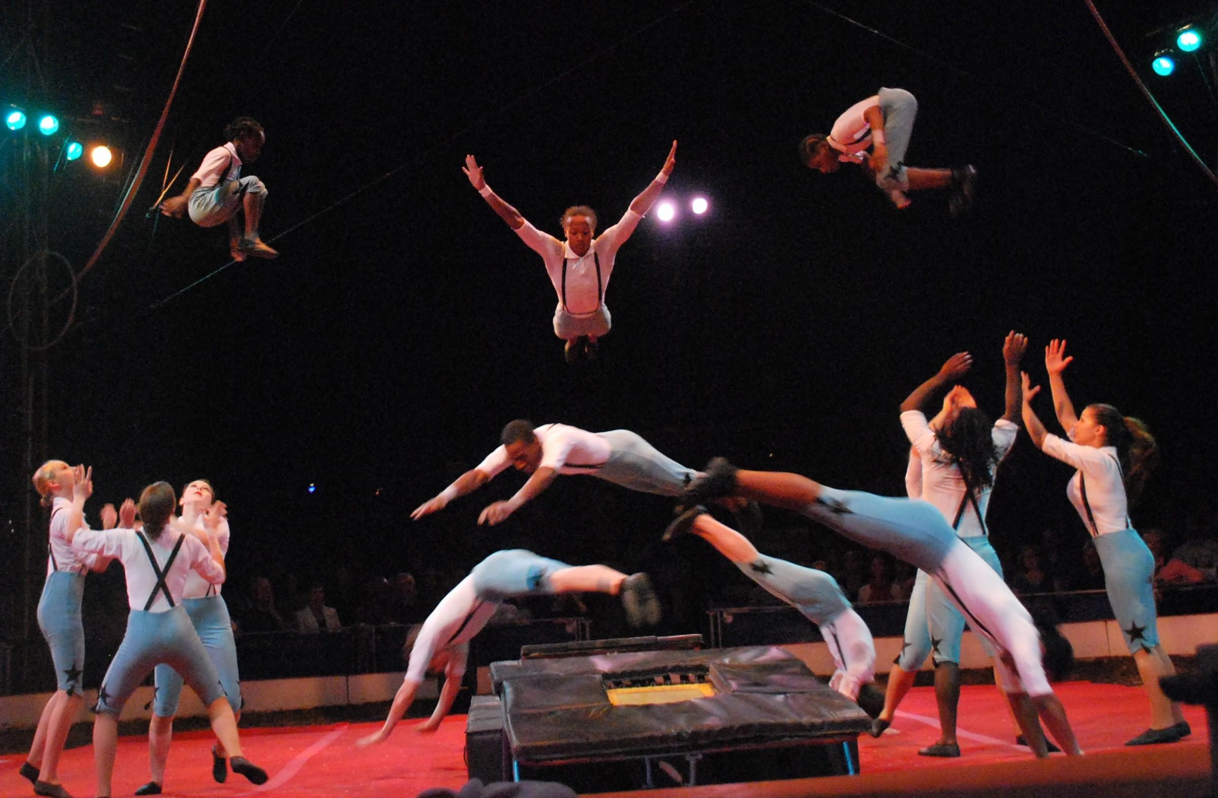 flipping acrobats in circus show