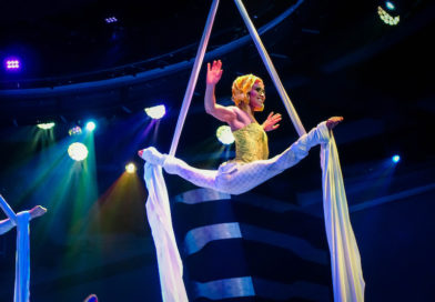 Silvia Dopazo performs a split balance on aerial silks