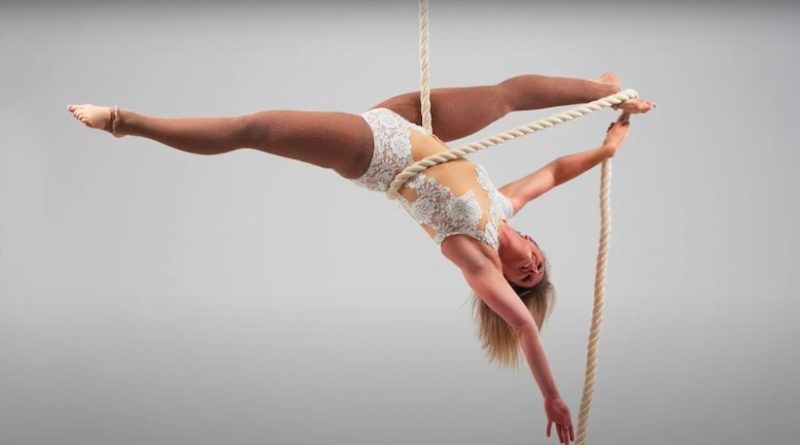 Louise Clark performs an upside down split on aerial rope
