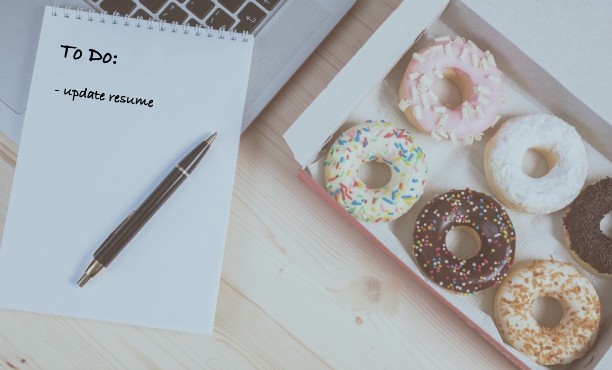 a To Do list that says update your resume next to a box of assorted donuts