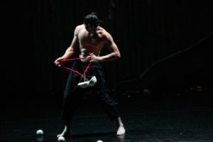 Acrobat with a meteor hammer prop, as used in Taiwanese circus. Part of Formosa Circus Arts' show 