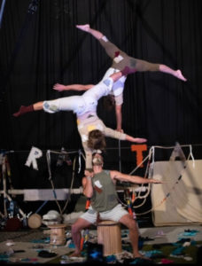Cirque Us Acrobats Justin Durham and Maeve Beck balance on each other