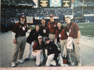 The athletic trainers for the WSU football team at the Holiday Bowl, 2003