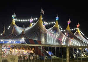 Garden Bros circus lit-up circus tent