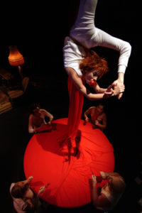 circus performer Isabella Chasse does a backbend in Les 7 Doigts' LOFT 