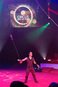 Diablo artist Elan Espana performs in center stage at the 2022 Circus Ring of Fame Induction ceremony