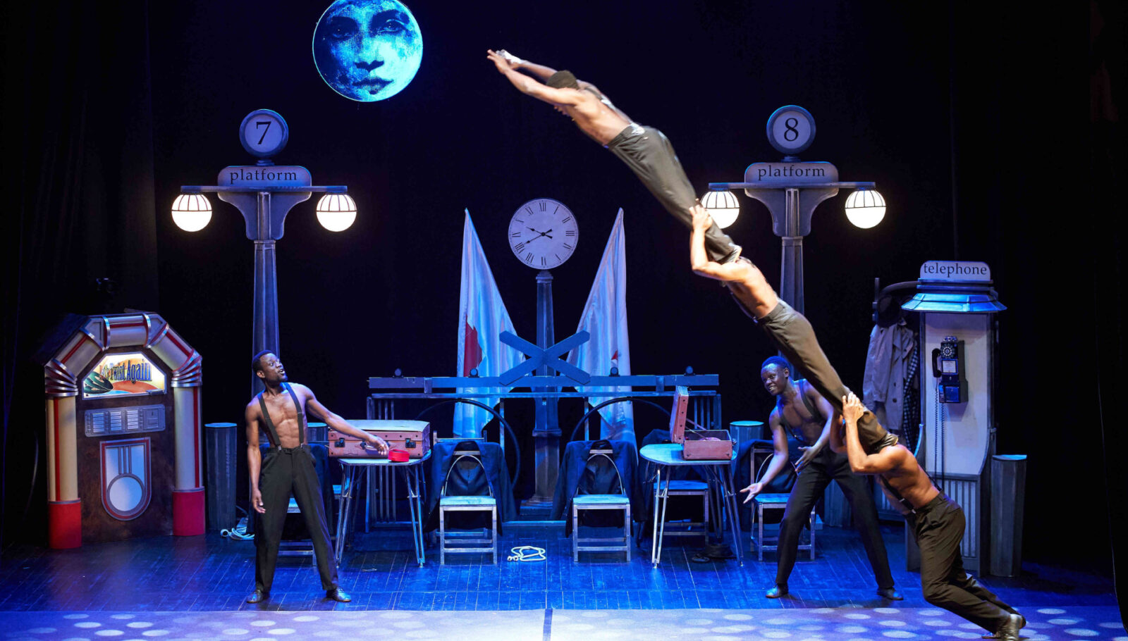The Black Blues Brothers circus show features five young Kenyan male acrobats performing stunts on a Cotton Club-inspired stage