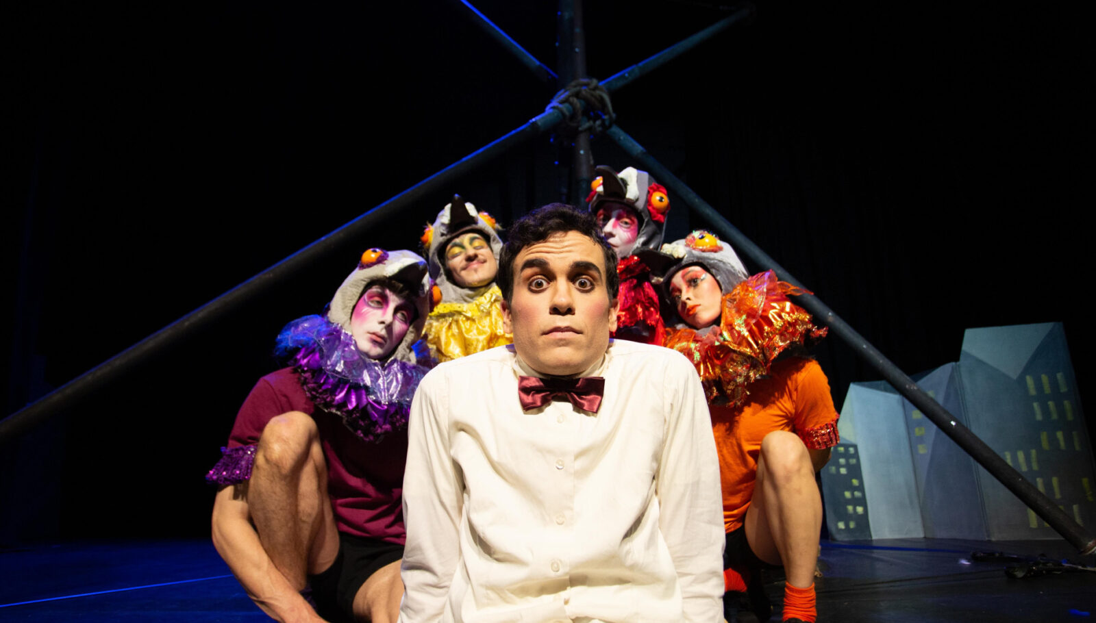 Five circus artists from UK company Brainfools in costume for their show Lucky Pigeons