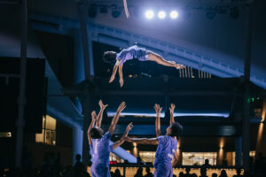 Throwing and catching acrobatic act in Bonfire Circus' "Forget-Me-Not" show, performed in Singapore at Flipside 2023