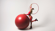 Big Red Circus Ball- Hula Hoop Walking Globe Act - Circus Acts - CircusTalk