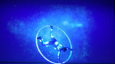 LED CYR WHEEL with LED SUIT - Circus Acts - CircusTalk